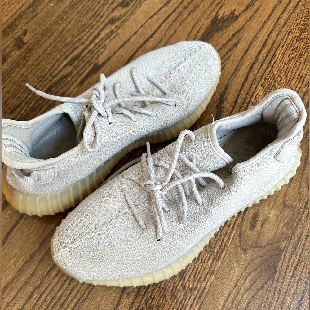 Beige Yeezys size 11 men. Shoes have been worn but are in good condition.